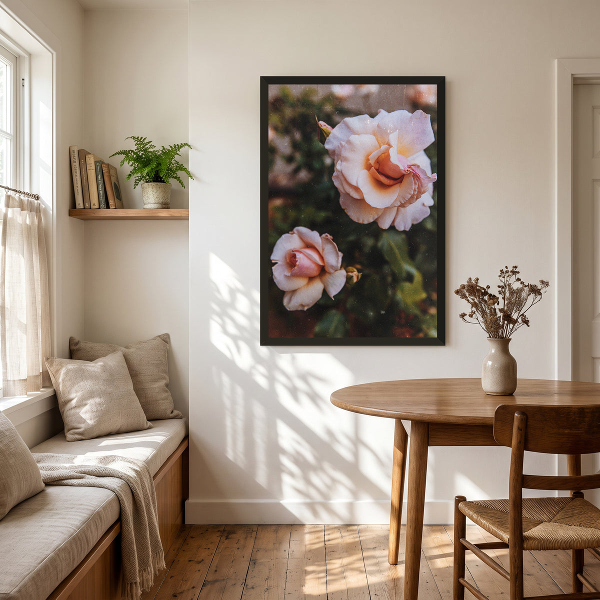 Apricot Candy, 24×36 inch print shown in a styled room mockup. Two pale peach roses blooming among deep green leaves. Frame shown for styling; print sold unframed.
