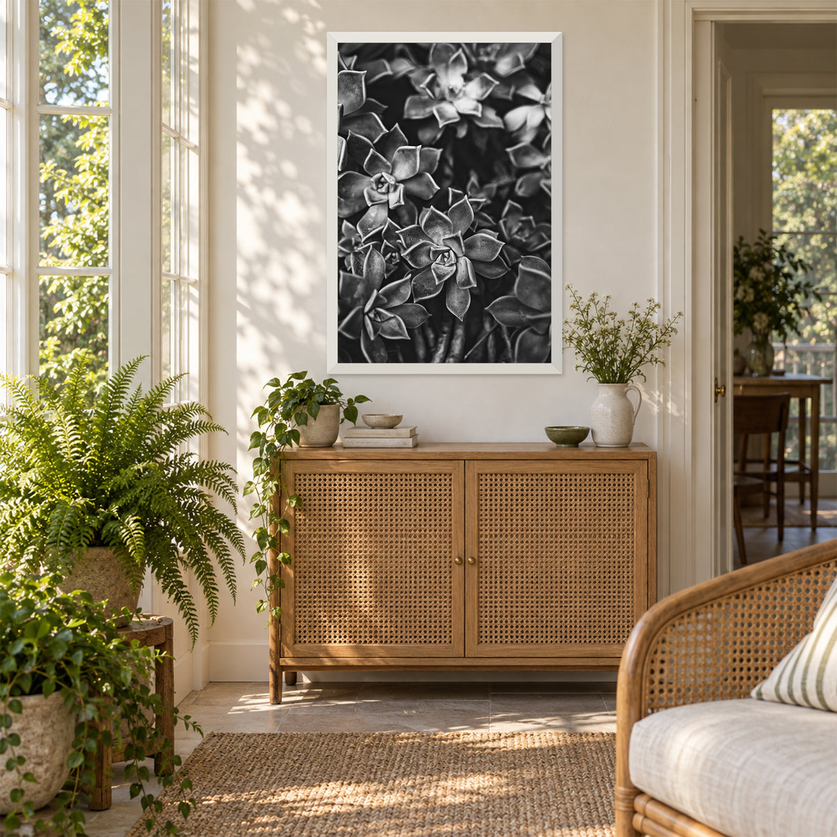 Ghost Plant Succulent I ︱ In Noir, 24×36 inch print shown in a styled room mockup. Dense cluster of succulent rosettes rendered in high-contrast black and white. Frame shown for styling; print sold unframed.